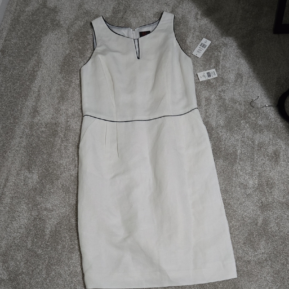Chic Cream Sleeveless Dress with Black Trim